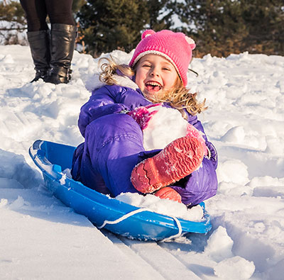 Little Girl Sledding